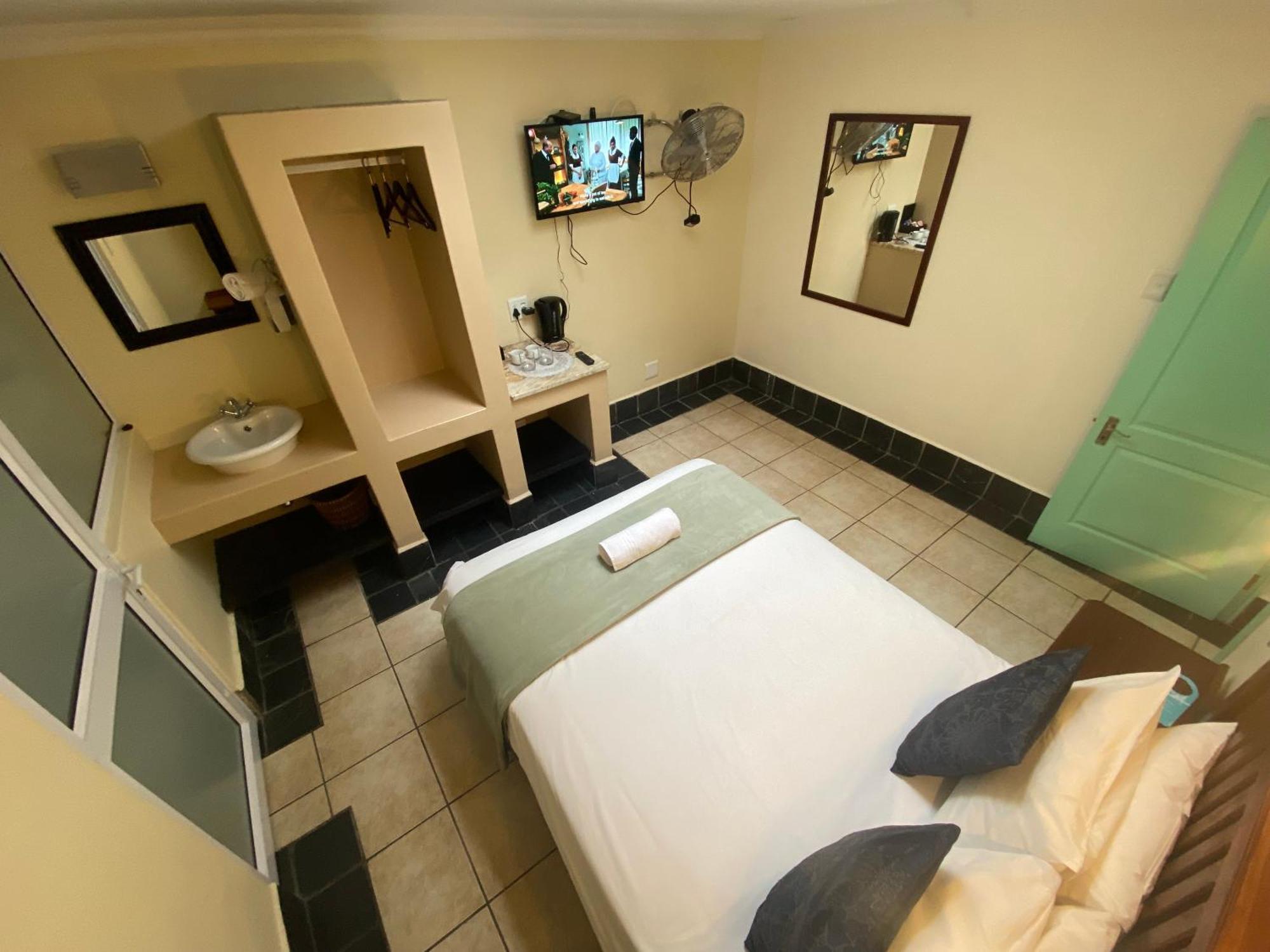 Green Door Guesthouse Моссел-Бей Номер фото